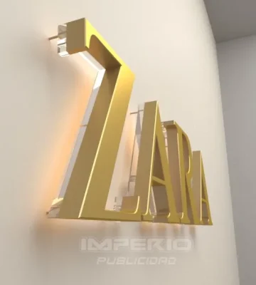 Letrero 3D de ZARA en color dorado con luz posterior cálida y base de acrílico transparente
